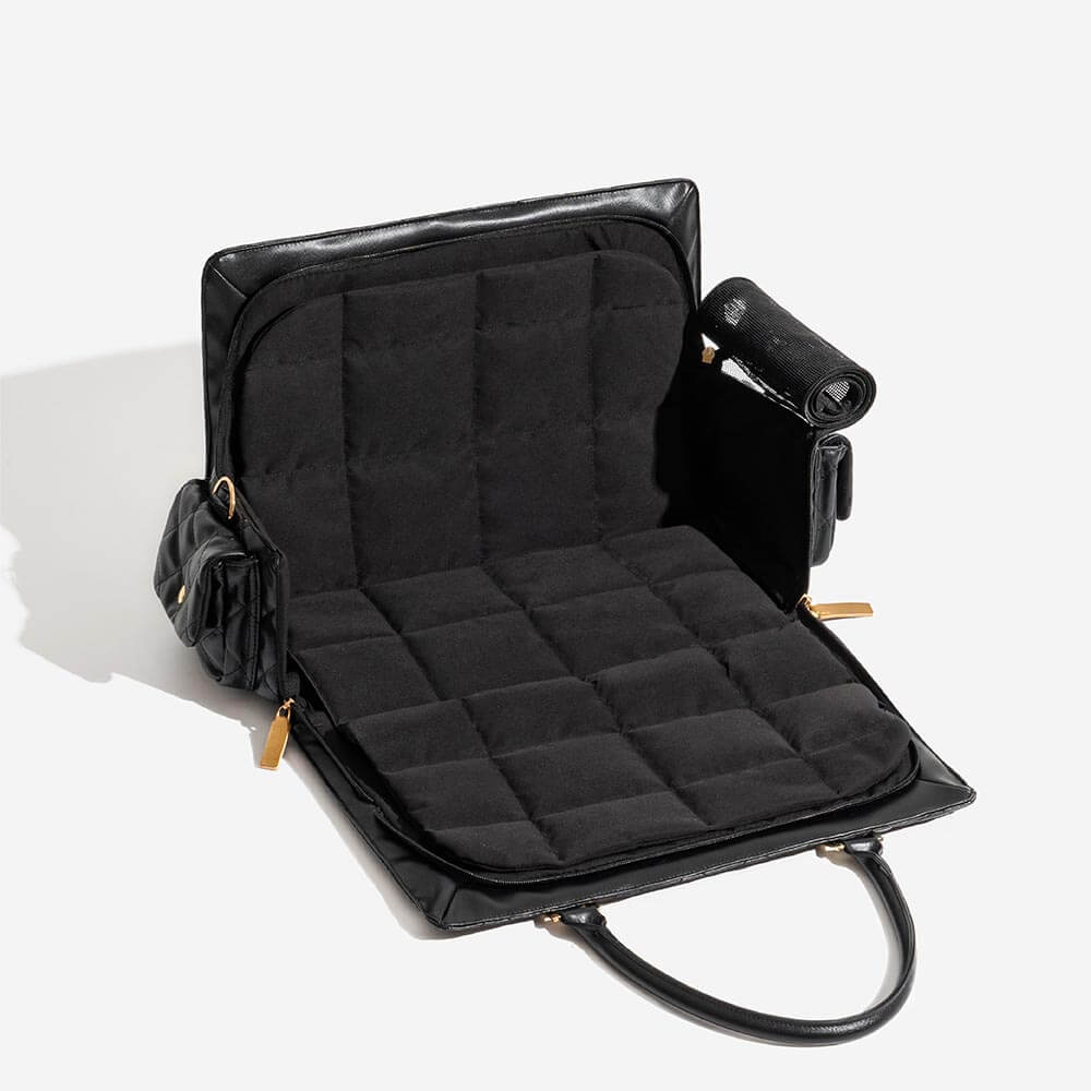 Puppy travel bag, black, designed for comfort and ease of use on the go.