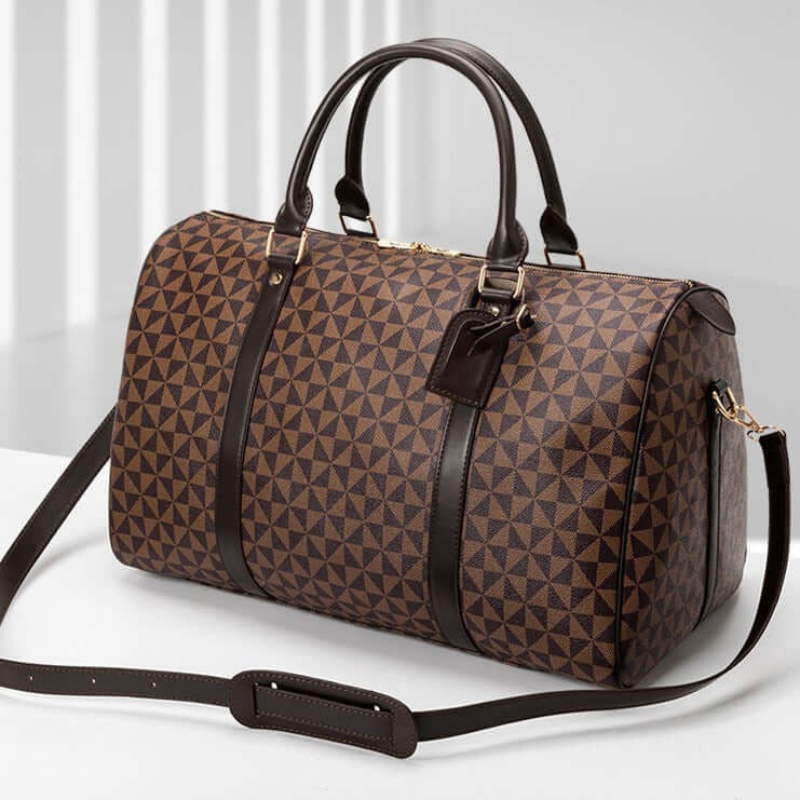 Premium brown unisex travel duffle bag; a stylish and versatile carry-on for weekend trips.