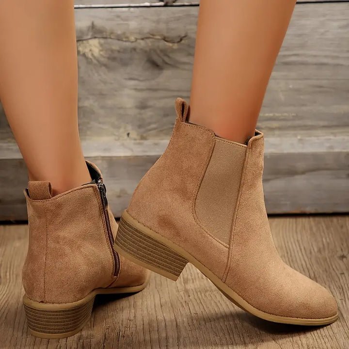 Elegant women's Anica Classic Chelsea boots, versatile for stylish fall and winter outfits. Durable ankle design.