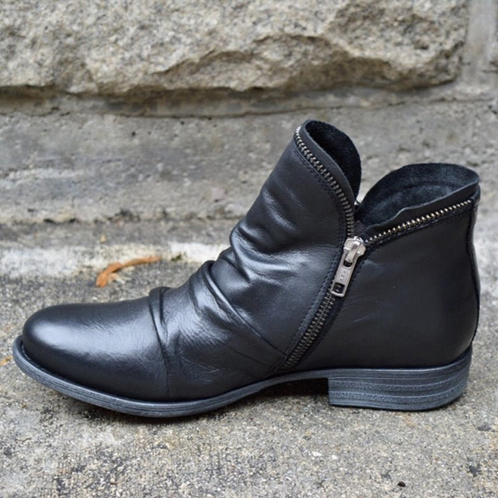 Stylish women's black ankle boots, comfortable fall fashion footwear for autumn wear.