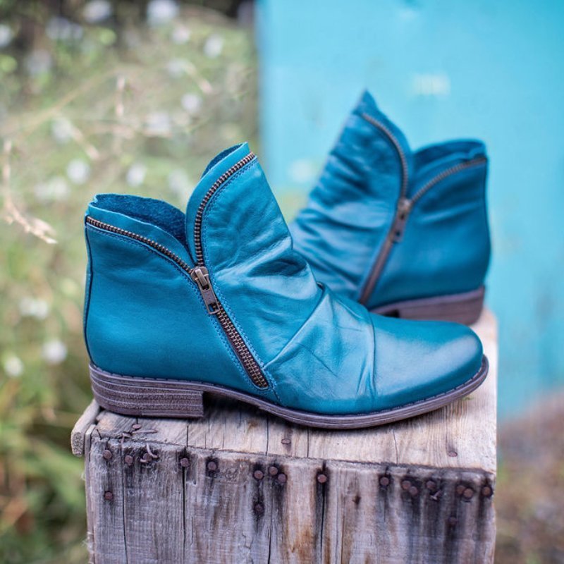 Modern women's autumn ankle boots, combining stylish design with comfort for fall fashion.
