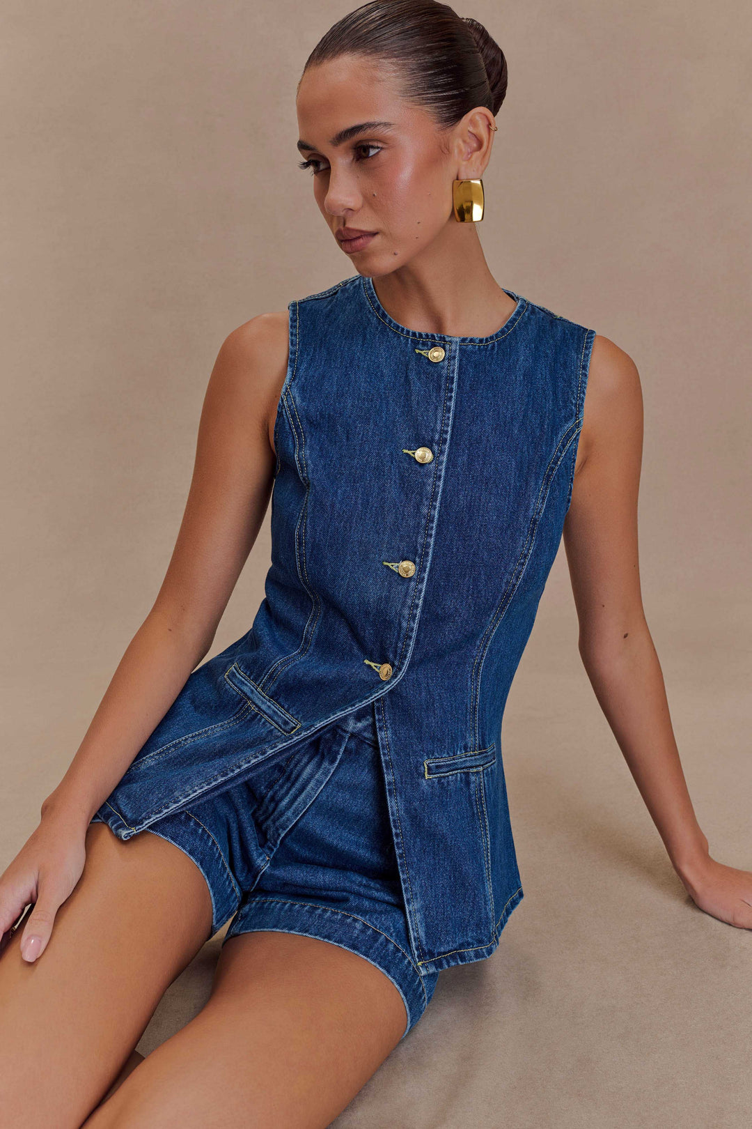 Chic women's blue denim set, a versatile two-piece outfit offering both style and comfort.