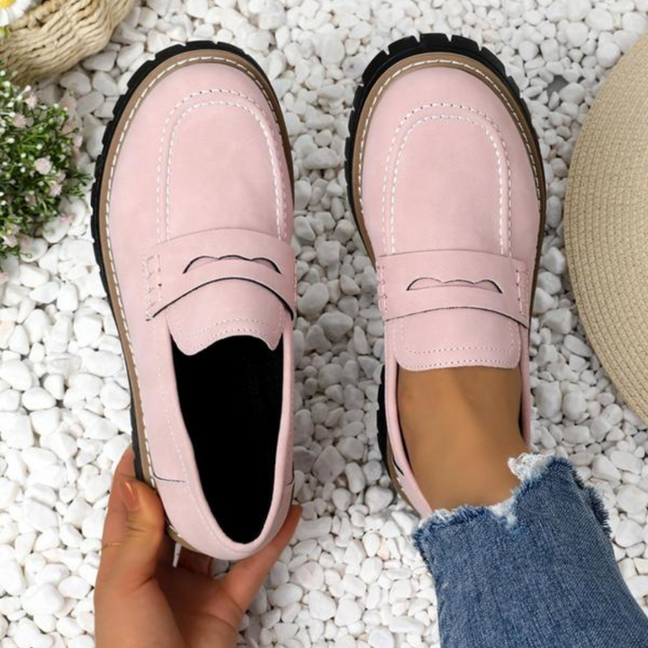 Beige women's platform loafers featuring a trendy chunky sole and easy slip-on style, ideal for spring fashion.
