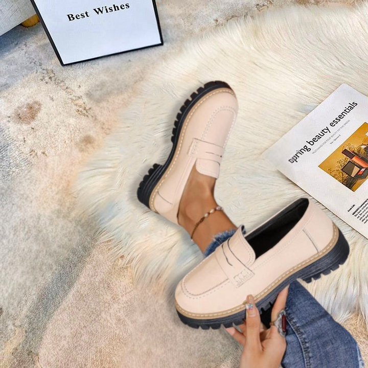 Comfortable pink women's platform loafers with a chunky sole, perfect slip-on shoes for everyday fashion.