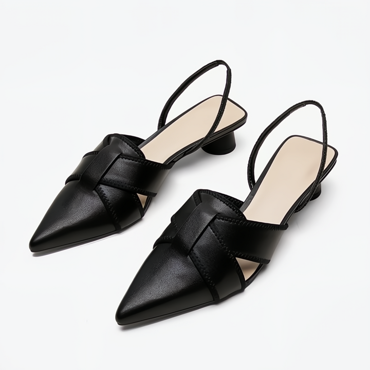 Stylish women's flat low heel sandals, perfect for comfortable everyday wear and casual summer outings.