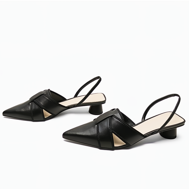 Comfortable women's flat low heel sandals, designed for all-day wear and stylish everyday versatility.