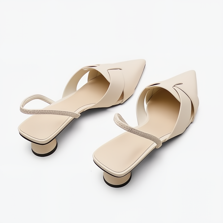 Elegant women's flat low heel sandals, providing exceptional comfort and stylish appeal for daily wear.