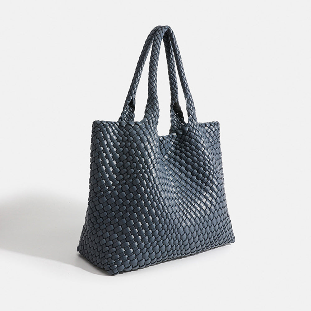 Modern women's woven shoulder tote, large capacity handbag for work and travel.