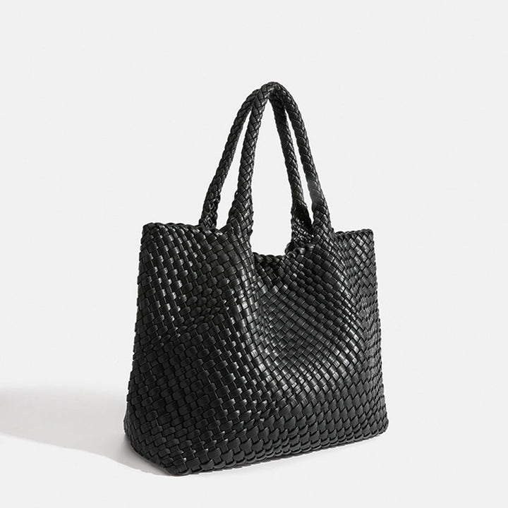 Elegant women's woven shoulder tote bag, roomy for work, travel, or leisure.