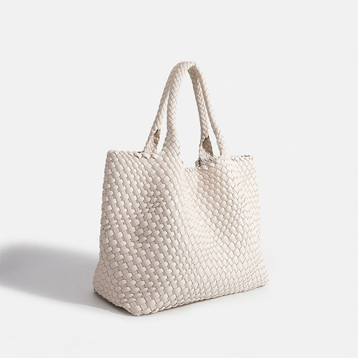 Trendy women's woven shoulder bag, spacious and elegant for a polished look.