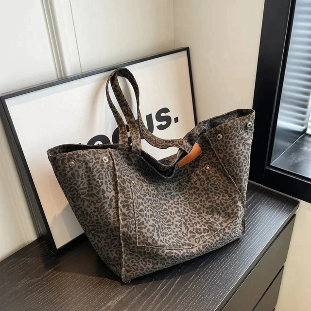 Chic leopard print women's shoulder bag, a fashionable animal print accessory for everyday use.