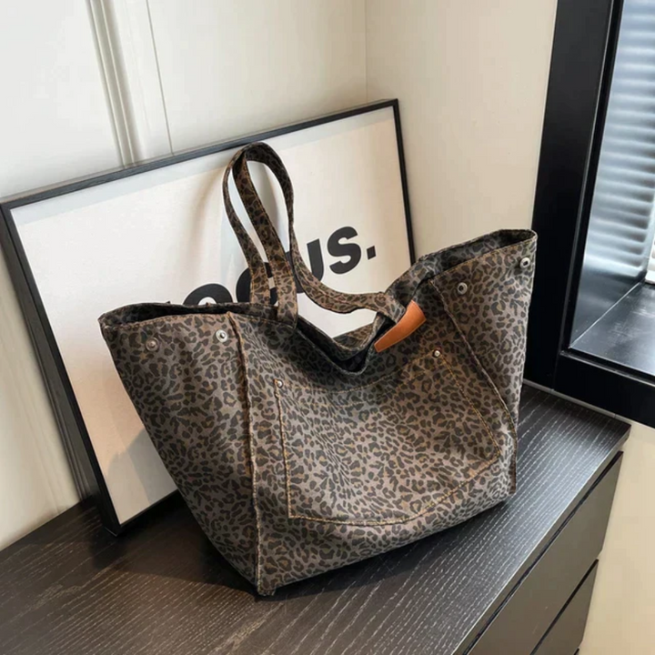 Chic leopard print women's shoulder bag, a fashionable animal print accessory for everyday use.