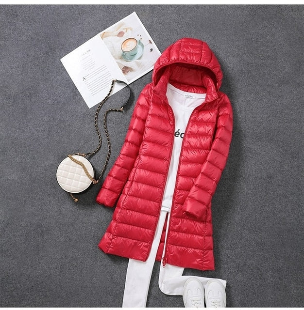 Cozy new women's hooded winter coat, a fashionable and warm outerwear choice for cold weather.