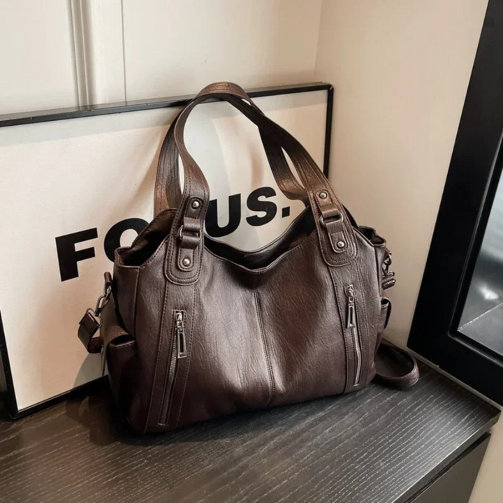 Practical brown multi-compartment shoulder bag for women. Work-ready, everyday elegant handbag with many pockets.
