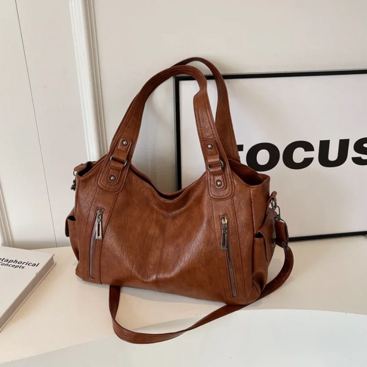 Chic multi-compartment women's shoulder bag. A stylish and elegant handbag, perfect accessory for modern fashion.