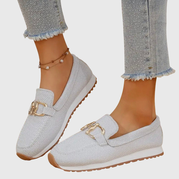 Close-up of women's orthopedic loafers, highlighting arch support and quality design.