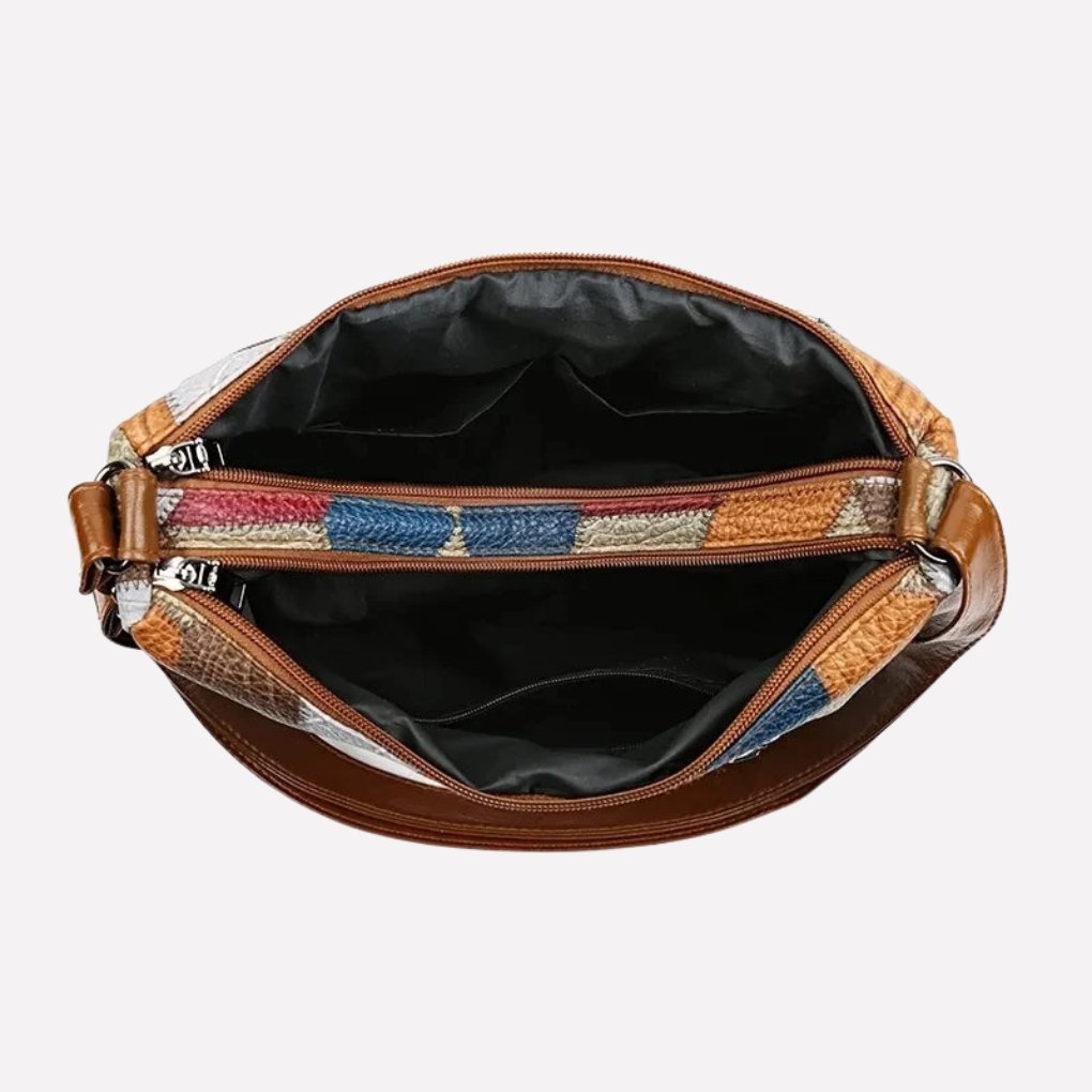 Fashionable women's patchwork shoulder bag showcasing unique braided accents. A stylish and secure everyday accessory.