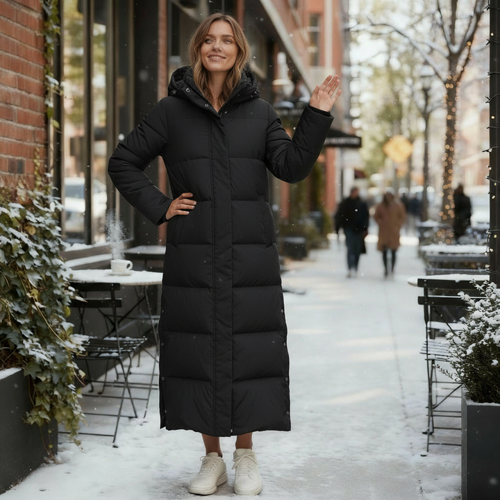 Cozy women's long quilted winter coat, elegant and warm, ideal outerwear for cold weather style.