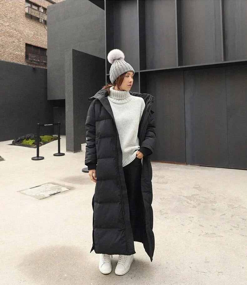 Elegant women's quilted long winter coat, warm outerwear, a stylish choice for fall & winter fashion.
