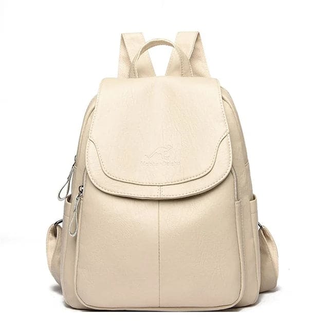 Stylish women's structured flap backpack in a solid color, perfect for daily essentials & work.