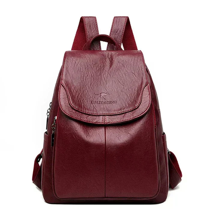 Chic structured flap ladies backpack, perfect for holding daily essentials with style and security.