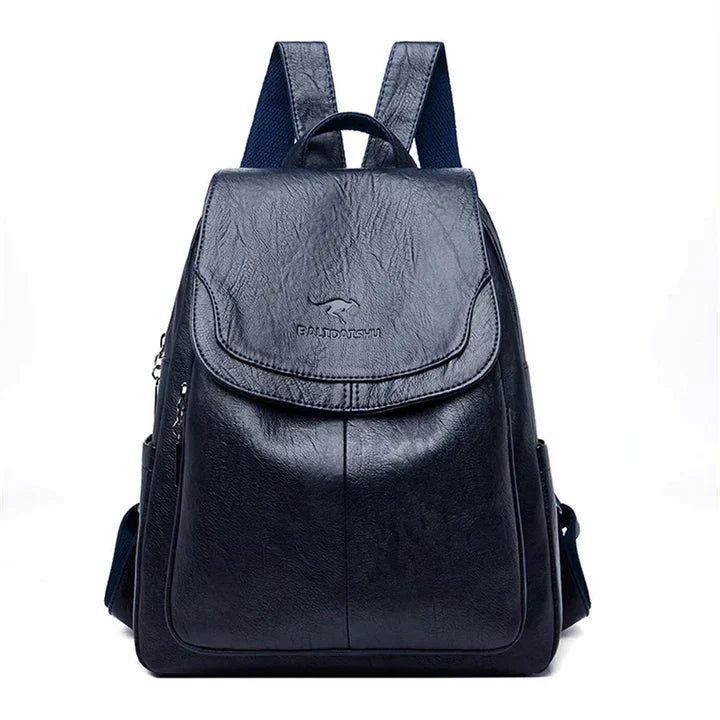Versatile women's structured flap backpack, suitable as a casual bag, work bag, or travel companion.