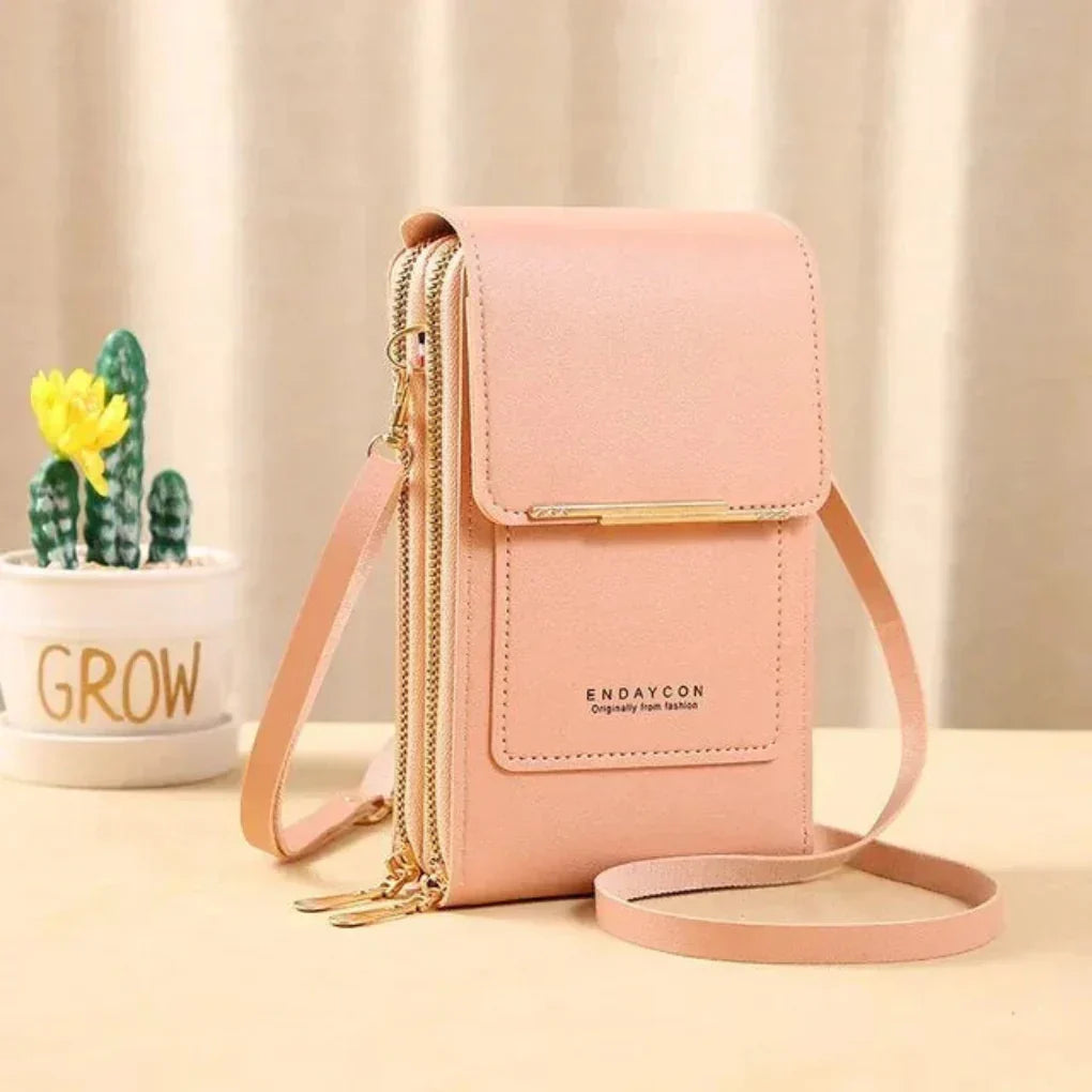 Secure women's travel crossbody bag with touchscreen phone pocket. Organizer for essentials, perfect for on-the-go.