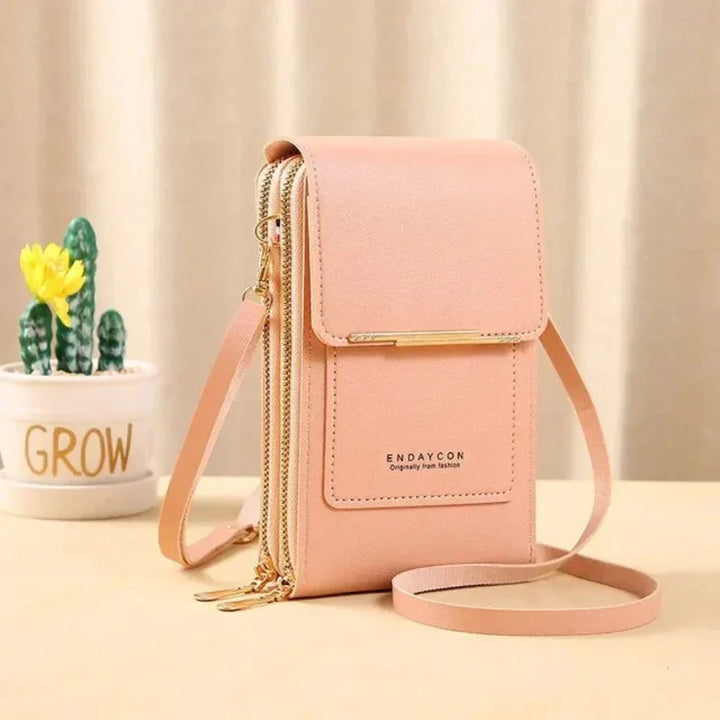 Secure women's travel crossbody bag with touchscreen phone pocket. Organizer for essentials, perfect for on-the-go.