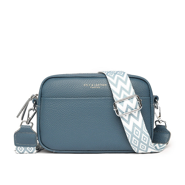 Woman wearing a stylish everyday crossbody bag, hands-free convenience for active lifestyle.