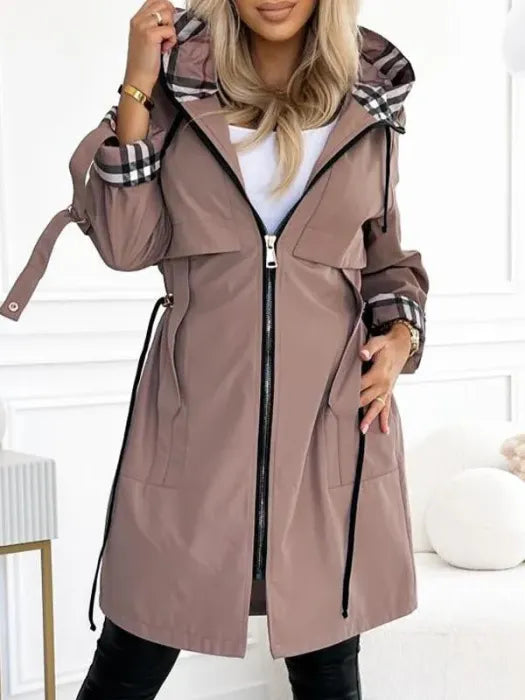 Stylish women's waterproof & windproof zip coat, perfect for all-weather protection & lightweight fall fashion.