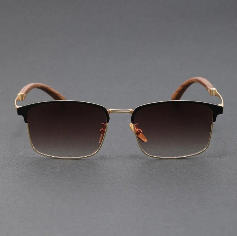 Classic browline sunglasses with polarized UV400 lenses. Stylish half-frame, lightweight alloy for unisex wear.