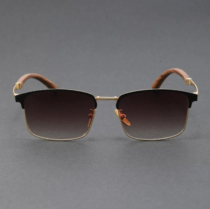 Classic browline sunglasses with polarized UV400 lenses. Stylish half-frame, lightweight alloy for unisex wear.