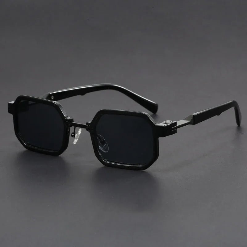 Fashionable unisex octagon sunglasses featuring a unique geometric frame design.