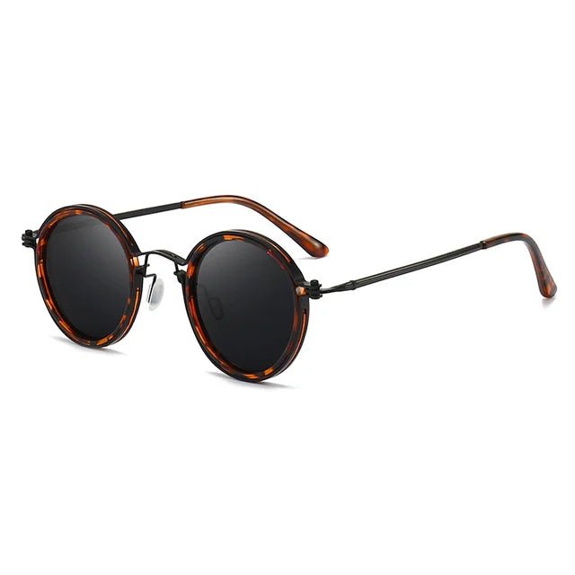 Modern unisex round polarized sunglasses featuring metal temples for comfort & UV protection.