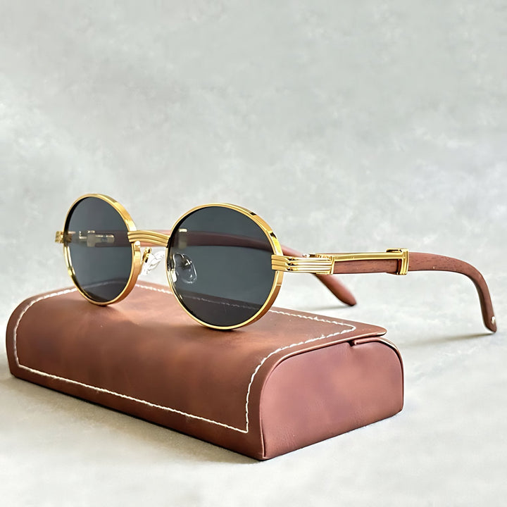 Unisex round gold frame sunglasses with UV400 protection. Stylish designer eyewear.