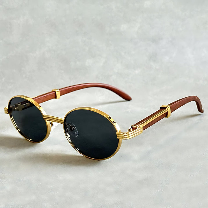 Stylish round gold frame sunglasses, perfect for eye protection with UV400. Unisex & versatile eyewear.