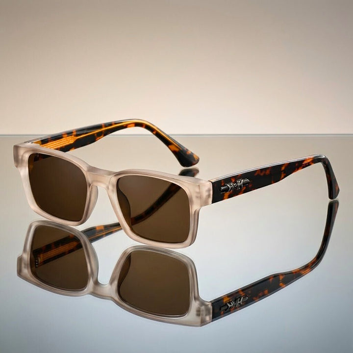 Elegant unisex square tortoiseshell shades with anti-glare UV400 lenses, perfect fashion accessory.