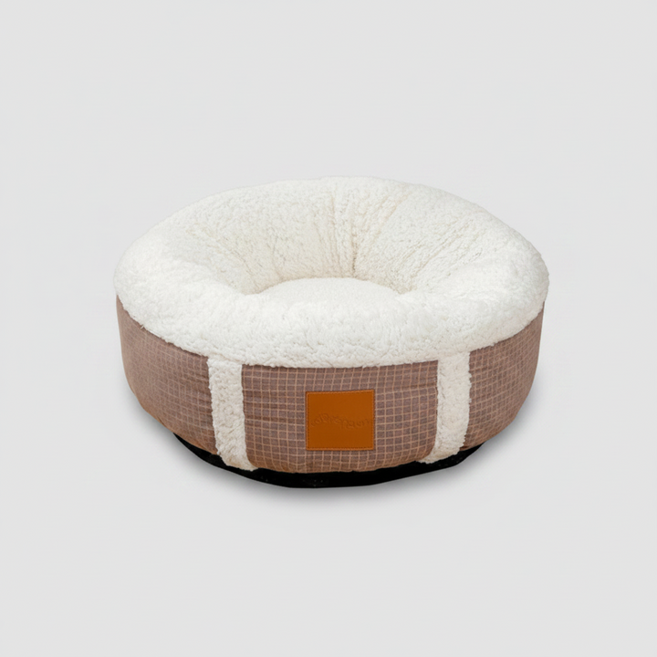 Cozy winter dog or cat bed. Super-soft plush pet nest, calming & washable for easy care during cold months.