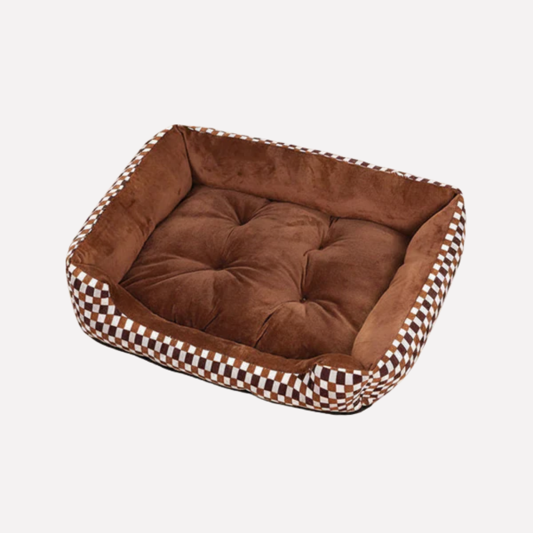 Supportive rectangle dog bed for pet comfort. Washable indoor dog accessory, ideal pet furniture.