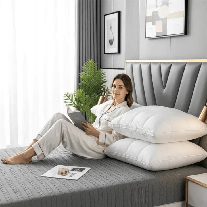 SWANDOWN pillow for balanced support & deep sleep. Plush feather & polyester bedding for restful comfort.