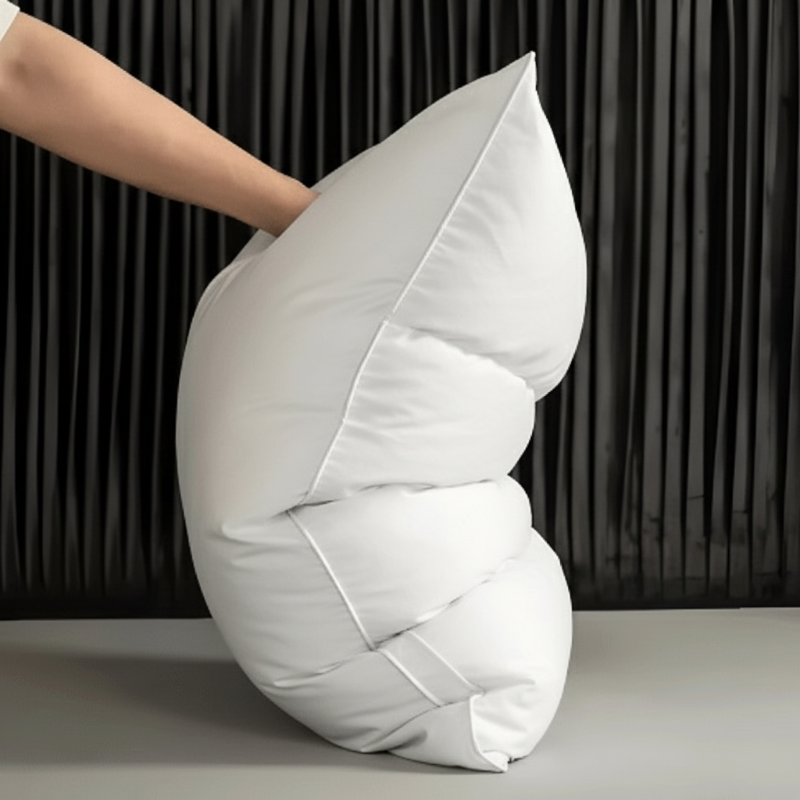 White SWANDOWN pillow texture. Balanced support, deep sleep, and luxurious bedding for enhanced bedroom comfort.