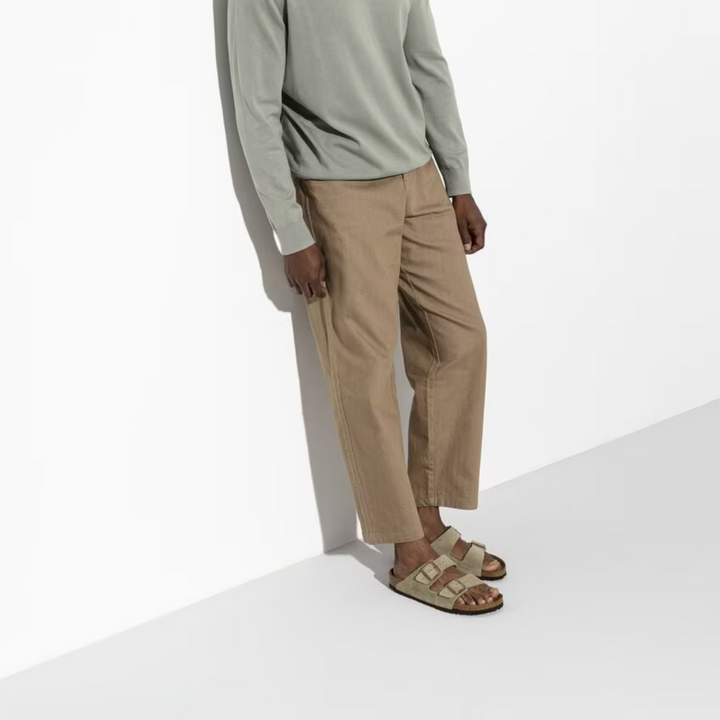 Taupe women's casual slip-on sandals with ergonomic design, adjustable strap, and supportive arch for summer comfort.