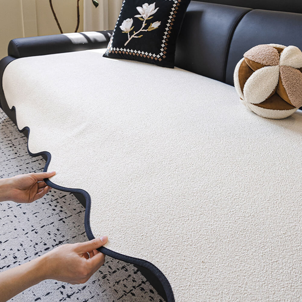 Corner detail of a non-slip teddy fleece sofa protector, durable and water-repellent