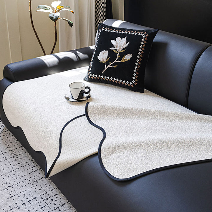 Top view of a cozy teddy fleece couch cover, machine washable and pet friendly