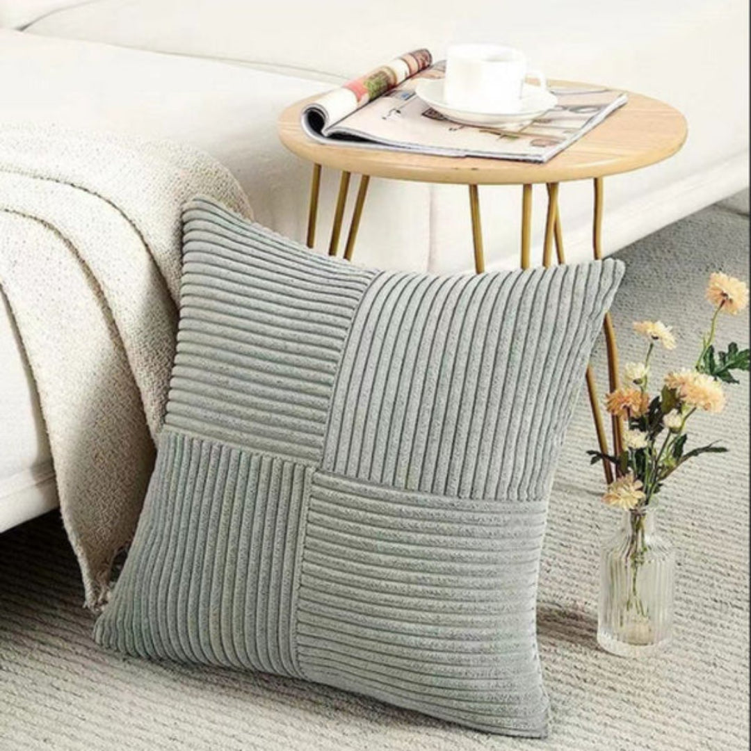 Elegant textured corduroy cushion cover adding a cozy touch to any sofa or bed, home decor accent