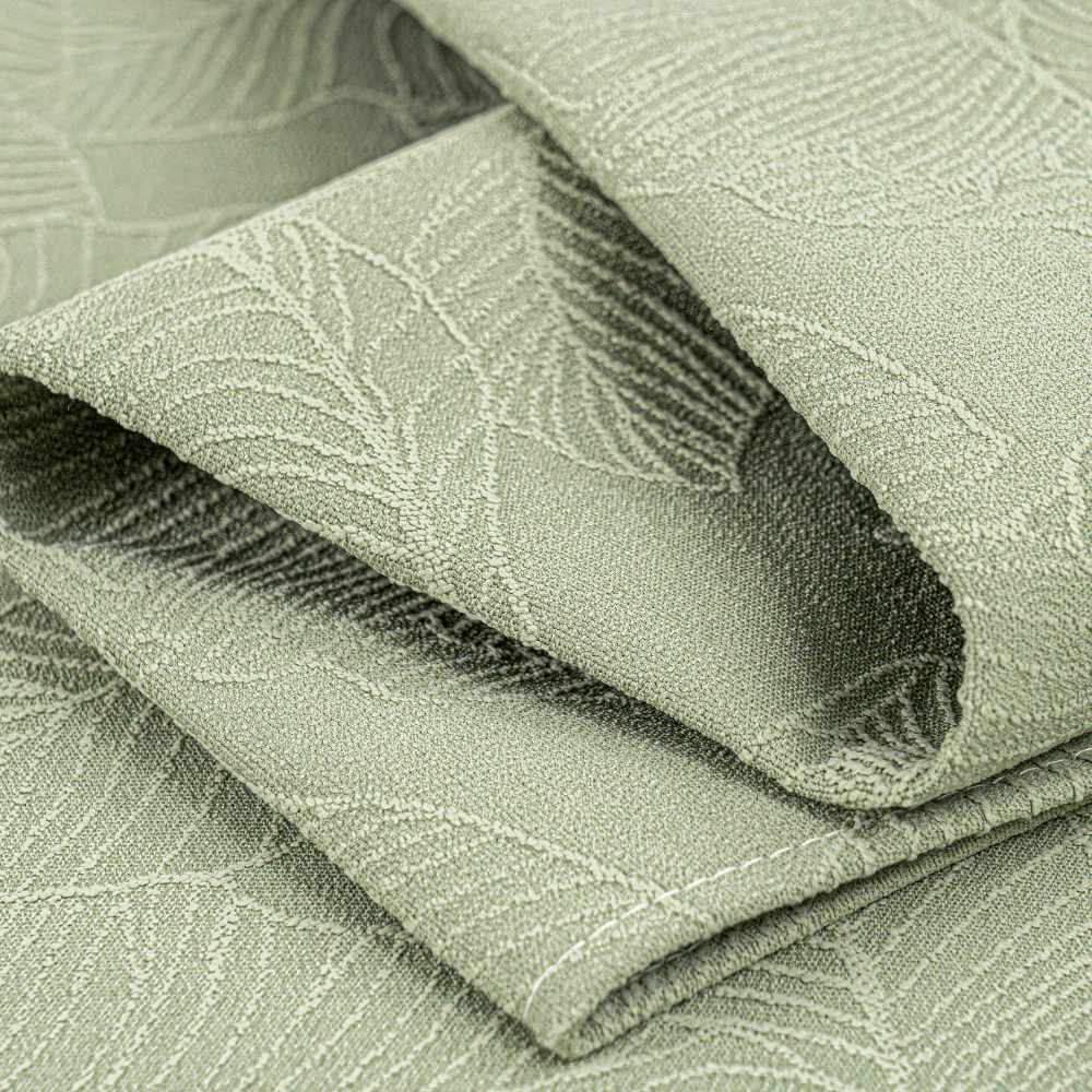 Non-slip textured jacquard sectional cover in dark gray, ideal for active families.