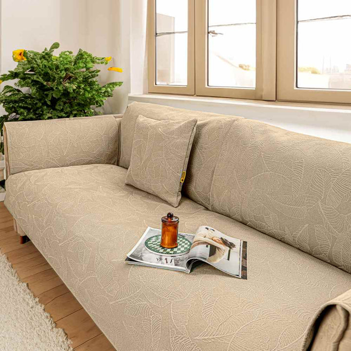 Soft chenille jacquard sofa cover, enhancing living room decor while protecting furniture.