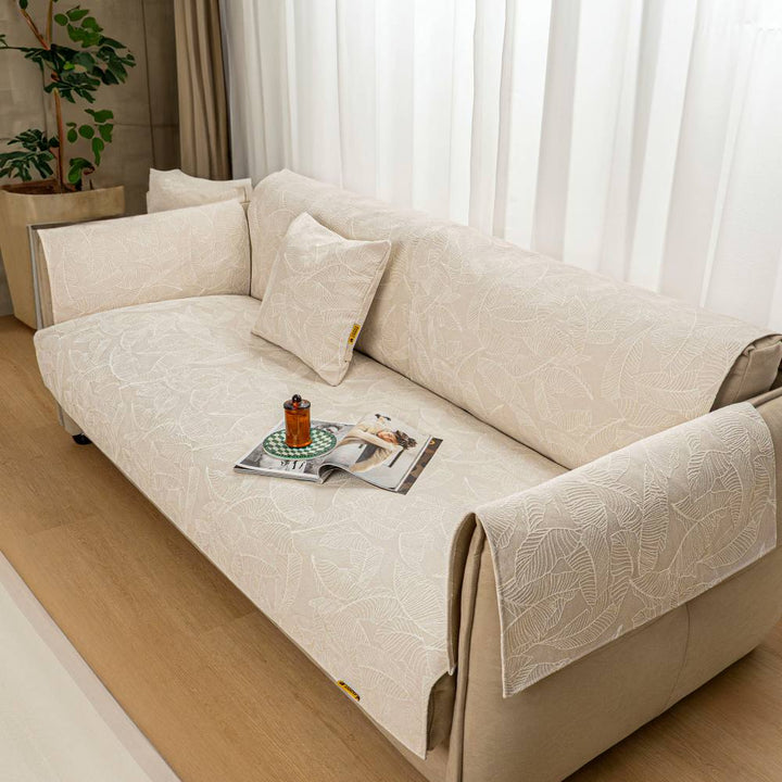 Stylish textured jacquard sofa cover, transforming living room furniture with ease.