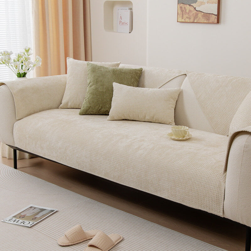 Easy-to-install Textured Waffle Chenille Couch Cover, showcasing its snug fit and protection.