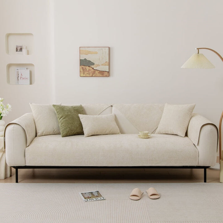 Textured Waffle Chenille Furniture Protector in a modern living room setting, enhancing decor.